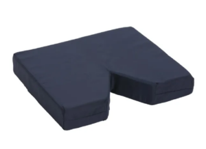 A square, navy-blue cushion with a V-shaped wedge cut out of one side.