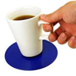 Small, blue circular mat with cup being placed on top