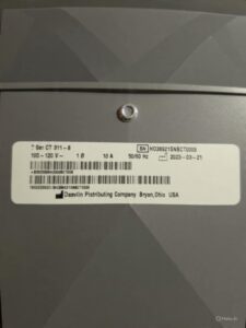 Sticker on lamp base containing barcodes, company information, serial number, and other information.