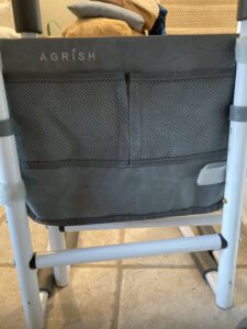 gray fabric between 2 poles with 2 mesh pockets