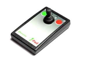 Rectangular joystick switch. Most of switch is black, but face of switch is a gray-to-white gradient. Includes a red button and a green button.