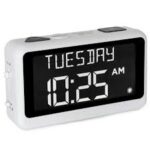white rectangular alarm with black screen with Tuesday 10:25 AM displayed largely on the screen and large buttons on top