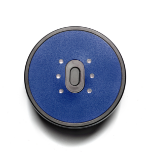 Circular black switch with blue face.