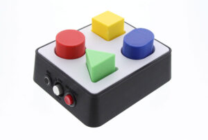 square device with 4 shape indentions and 4 different shapes and colors inserted into the indentions